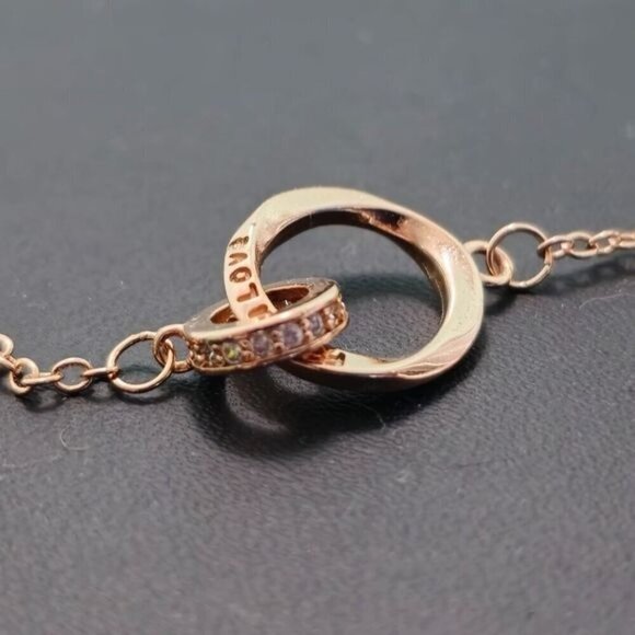 Interlocking Mobius Engraved Necklace‎ in Rose Gold (NWOT) - Picture 2 of 5